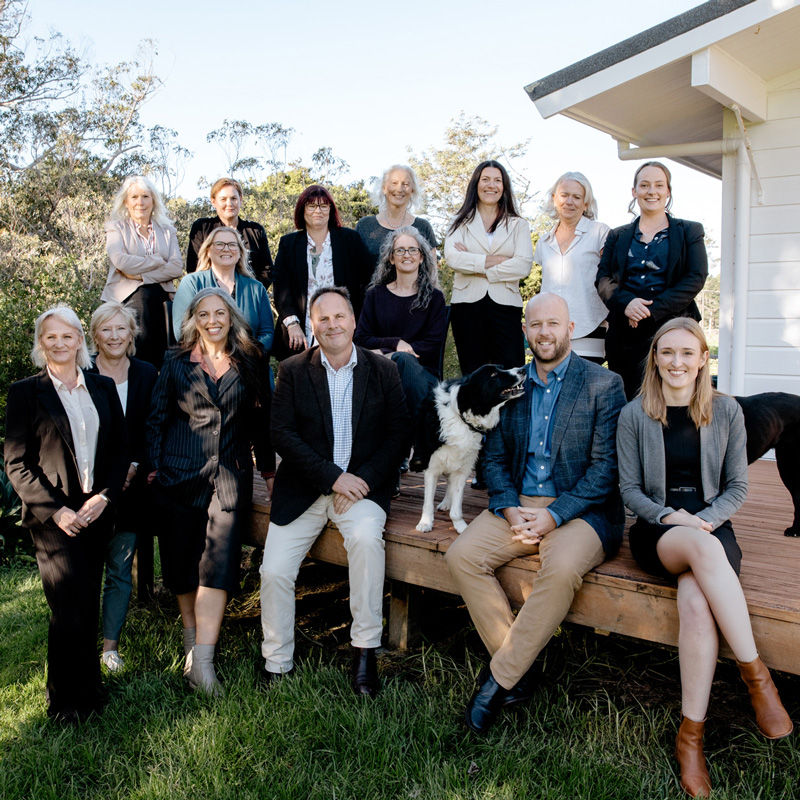 Sellars team sitting on a deck 